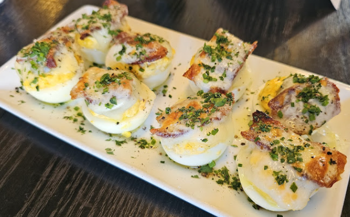 Marlowe signature dishes Warm Deviled EggsHerb Crusted Lamb RibsMarlowe Fries